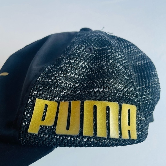 PUMA Women's Train Relax Fit Cap Black Gold - Picture 2 of 9